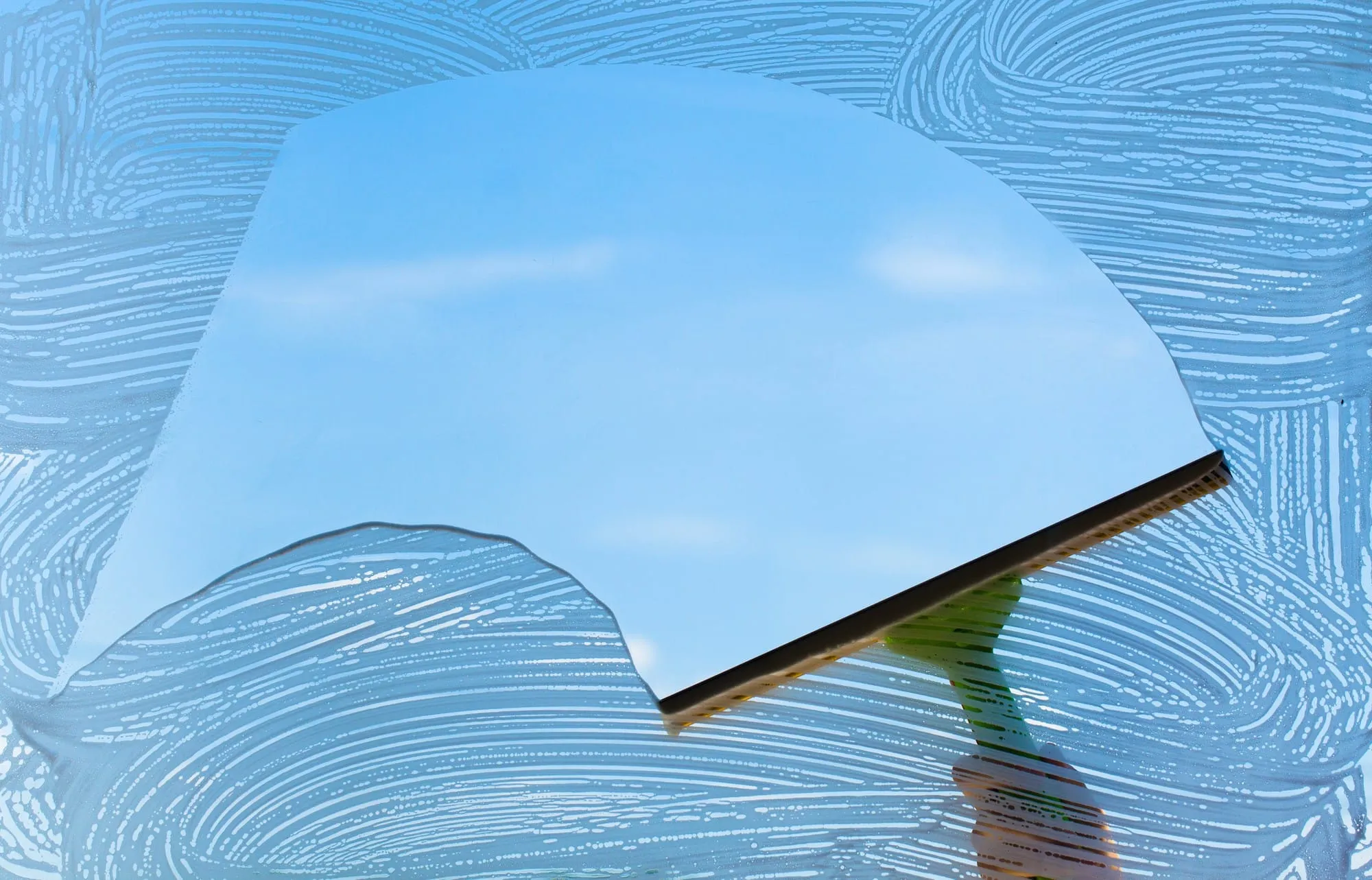 How Window Washing Can Protect Your Glass from Long-Term Damage