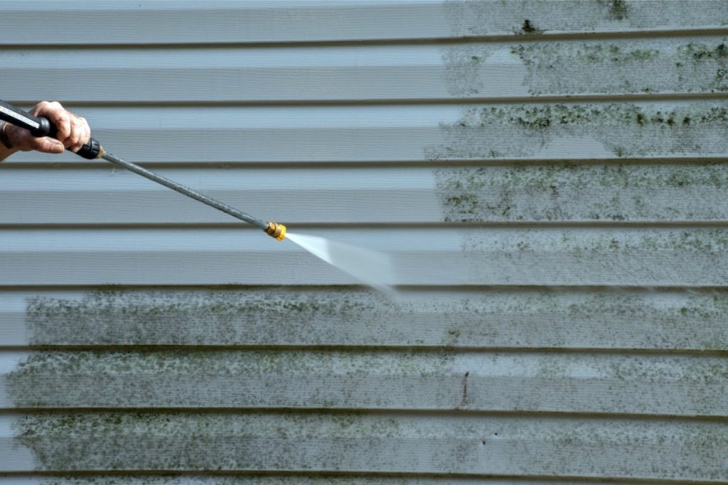 pressure washing house