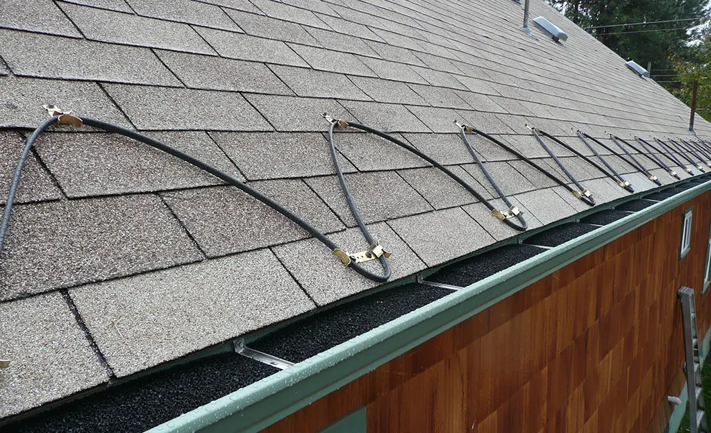 roof heating cable system to melt ice