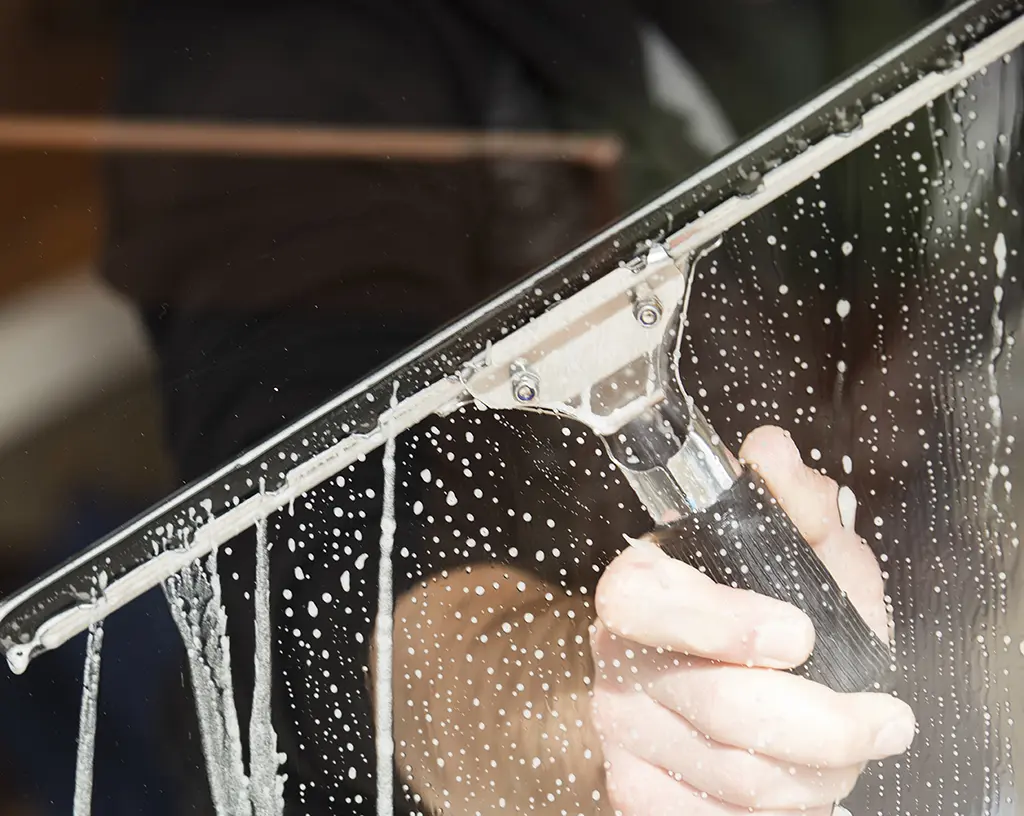 window cleaning technique using squeegee 